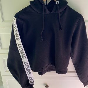 Cropped black hoodie in excellent condition, from smoke free environment.